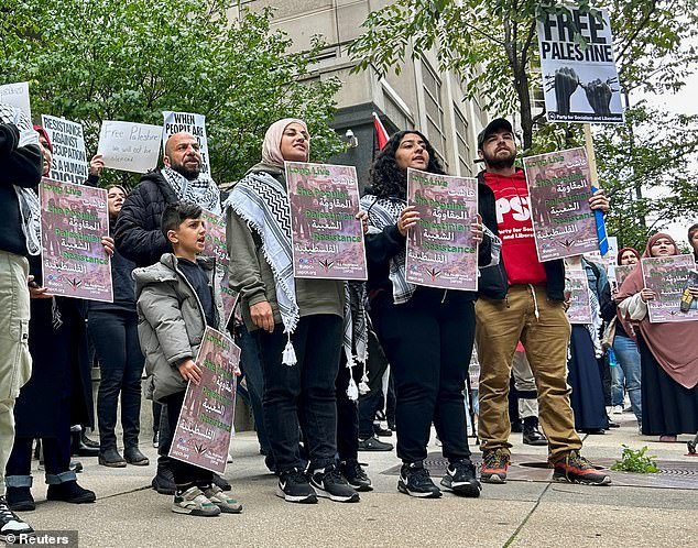 Palestinian-Americans were seen in some places mocking the dead, flashing swastikas and spitting in the direction of counter-protesters