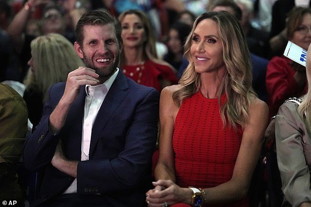 Eric (left) and Lara Trump (right) sat in the front row of the audience Wednesday night for the former president's Club 47 event in West Palm Beach, Florida