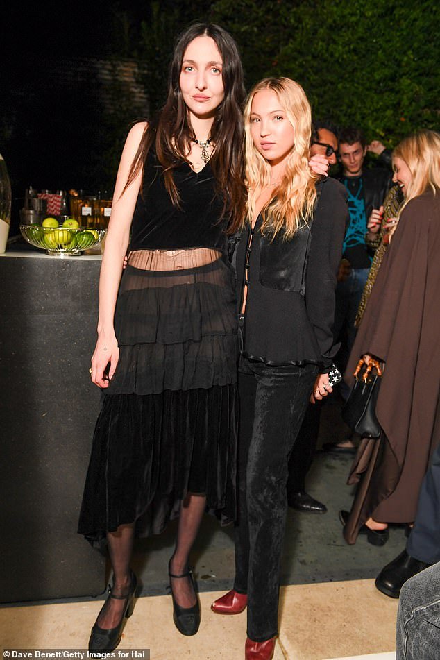 Perfect pairing: Lila beamed as she posed for the camera alongside Vogue beauty editor Tish Weinstock