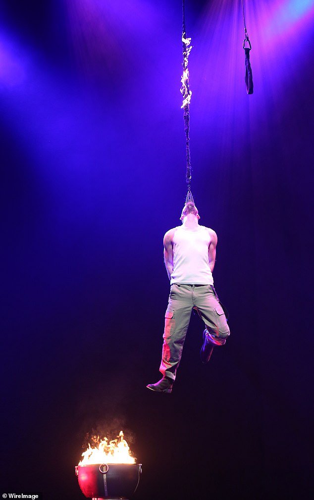 After being smashed in the midst of a fiery blast, Jonathan fell to the ground and reportedly hit his head on impact.  Pictured: Jonathan in The Illusionists in 2016