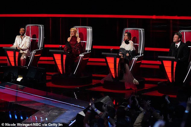 'Pressure': During an interview with Newsweek in September, she explained: 'It's a lot of pressure, because nobody can replace Blake Shelton.  He is a great personality and a wonderful person';  Shelton was seen on the far right on The Voice