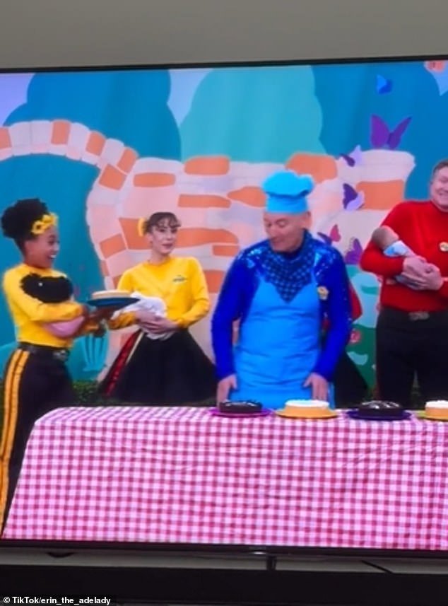 A fan uploaded a clip of The Wiggles TV series showing Wiggle support Eva, 26, dancing on the Picnic set with her bandmates.  Suddenly, Yell's lead Wiggle Tsehai, 17, enters the frame and positions himself directly in front of Evie, shielding her from the camera.