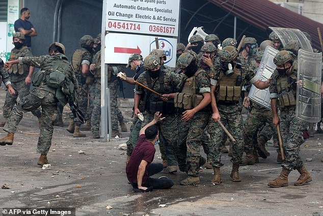 Lebanese soldiers clashed with a man outside the US embassy in Beirut, Lebanon today