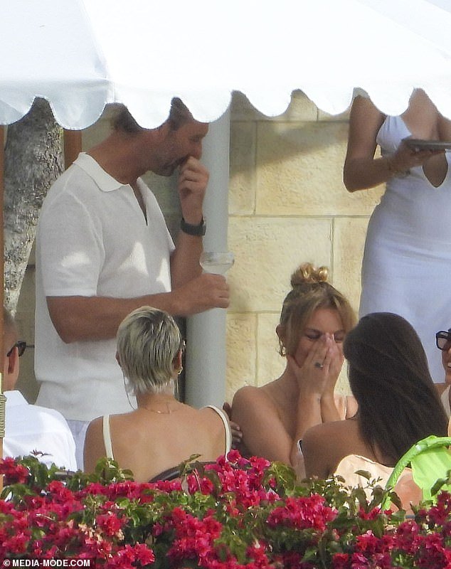 At one point, Madeline was seen covering her face in embarrassment as Justin toasted her