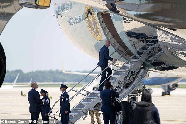 President Joe Biden is seen boarding Air Force One in July via the shorter staircase.  After several tripping incidents, he boarded and disembarked from the presidential plane via these stairs