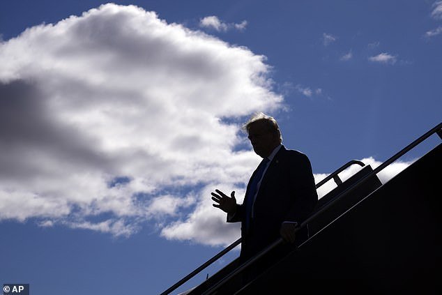 Trump is photographed arriving in New Hampshire on Monday, where he takes his so-called 'Trump Force One' off the plane.  The ex-president went to Concord to officially register as a candidate for the 2024 Republican primary in New Hampshire before holding a rally in Derry