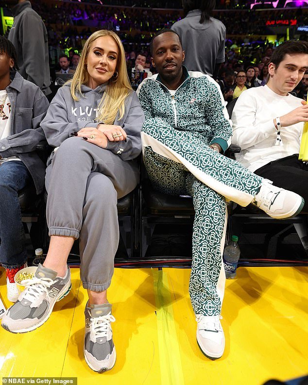 Settled: The London-born hitmaker praised her other half - sports agent Rich Paul , 44 - but admitted she's jealous of her friends seeking romance on the dating apps