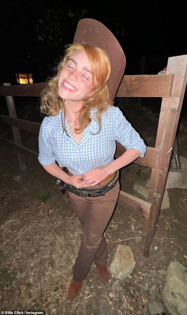 Playful: Billie Eilish joined in as she impersonated Jane Fonda in the 1965 western Cat Ballou
