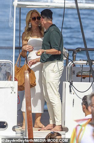 Carrie took off her shoes before leaving the boat