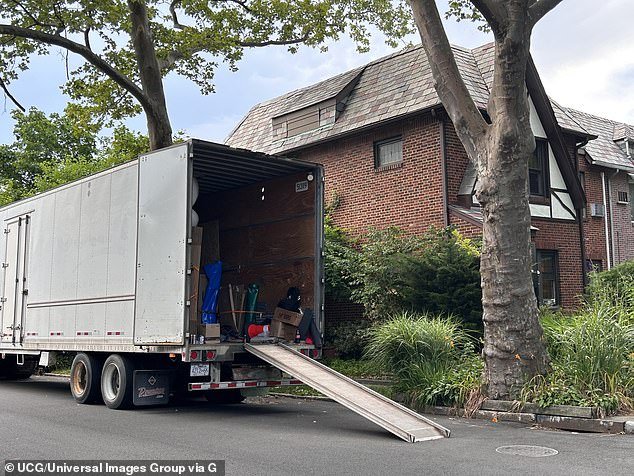 Time to go.  A moving van outside a home in Queens, New York City