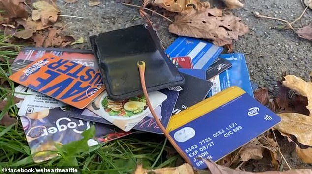 About a dozen stolen credit cards were found at the scene, another resident claims