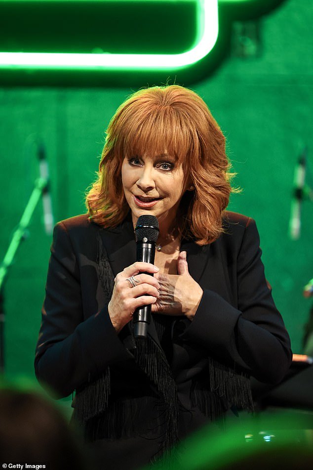 Say what now?  Reba, 68, slammed speculation that she is 'unhappy' and is leaving The Voice shortly after joining the competition series as a coach in September