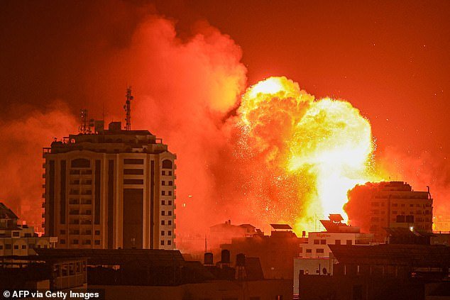 Violence: Image of a fireball erupts from an Israeli airstrike on Gaza City on October 9
