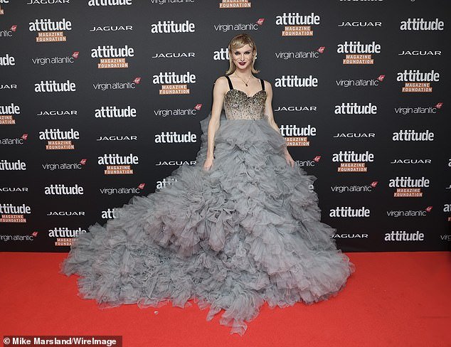 The influencer - who came out as a transgender woman during the COVID-19 pandemic - posed in a gown with a billowing ruffled skirt