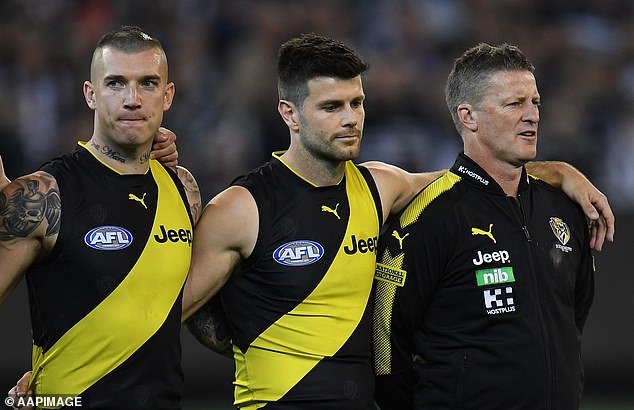 Trent Cotchin (centre) tells how the breakdown in Damien Hardwick's marriage caused division in the Richmond dressing room