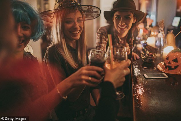 Costumes are a big part of Halloween — but one etiquette expert warned there are some unspoken rules about what you can and can't wear to work celebrations (stock photo)