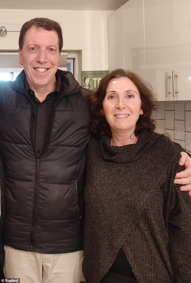 Adia Cohen, cousin of Dr Dvir Abramovich, hid in a safe room in Kibbutz Re'im, a secular settlement of 500 families located 1km from Gaza, while Hamas militants bombed it and then went house to house, killing her neighbors.  Pictured: Dr Abramovich and Mrs Cohen