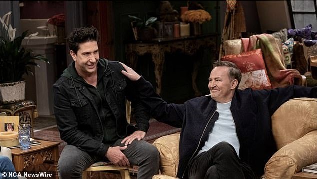 Perry is pictured with actor David Schwimmer (left) at the Friends reunion
