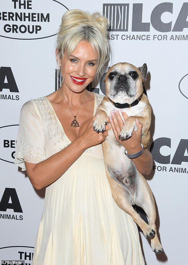 Nicky looked more youthful than ever as she donned a flowing cream dress for the Last Chance for Animals Gala in Beverly Hills earlier this month.  Taken a photo with Yoda