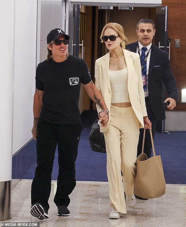 Keith Urban, 55, (left) was every inch the doting husband on Sunday when he picked up his wife Nicole Kidman, 56, (right) from Sydney Airport following her early morning arrival from the US