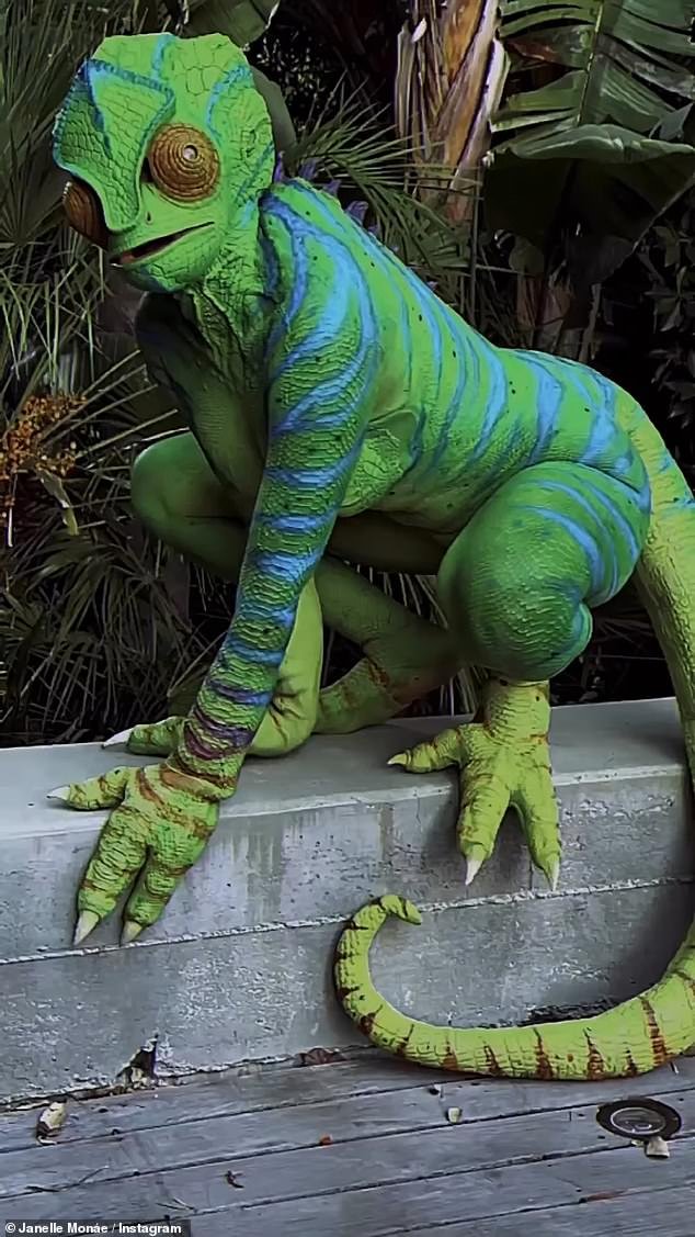 Wow!  Janelle, 37, stole the spotlight by dressing up as a chameleon in an incredible full-body transformation costume