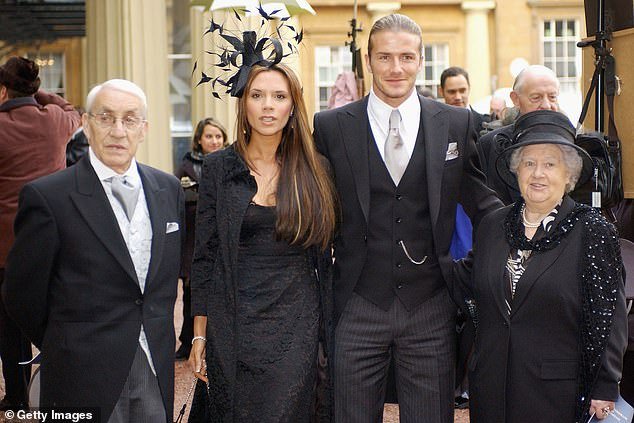 A proud Beckham family after David was awarded an OBE.  Pictured are his maternal grandparents, Joseph and Peggy West, Victoria and David