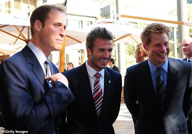 Princes William and Harry smile with Beckham at a Football Association reception in South Africa.  The friendship with Harry has since cooled