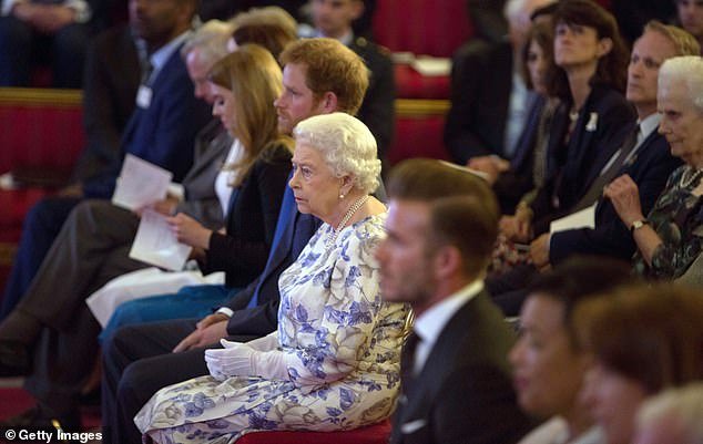 Beckham gets a seat close to Queen Elizabeth, Prince Harry and Princess Beatrice for the Queen's Young Leader Awards in 2016