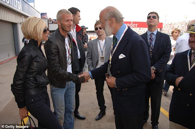 David and Victoria greet Prince Michael of Kent during the F1 Grand Prix at Silverstone, 2007