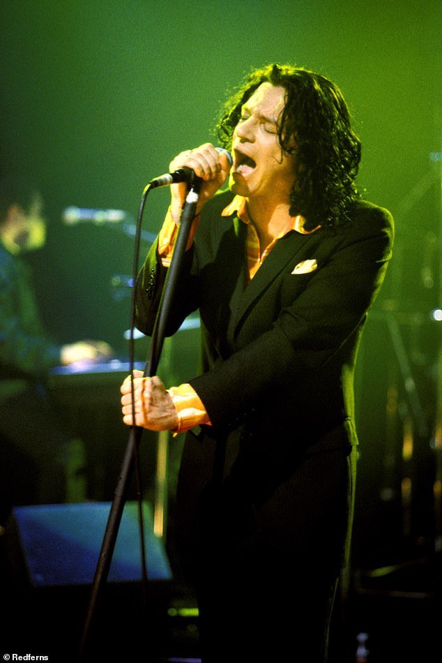 In the photo Michael Hutchence, singer and frontman of the rock band INXS