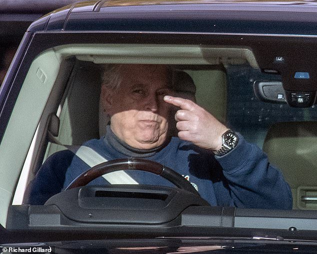 The Duke of York, 63, was dressed casually in a navy blue jumper as he drove through the Berkshire estate, shielding his eyes from the autumn sun