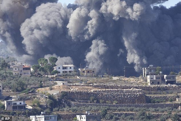 Black smoke rises from Aita-al-Shaab, a village in Lebanon near the border with Israel
