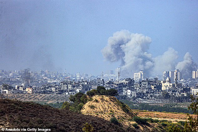 Smoke rises from the Gaza city of Beit Hanoun as Israel continues its military action against Hamas