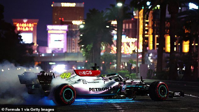 Lewis Hamilton of Great Britain and Mercedes drive on the track during the launch party of the 2023 Formula 1 Grand Prix of Las Vegas on November 5, 2022
