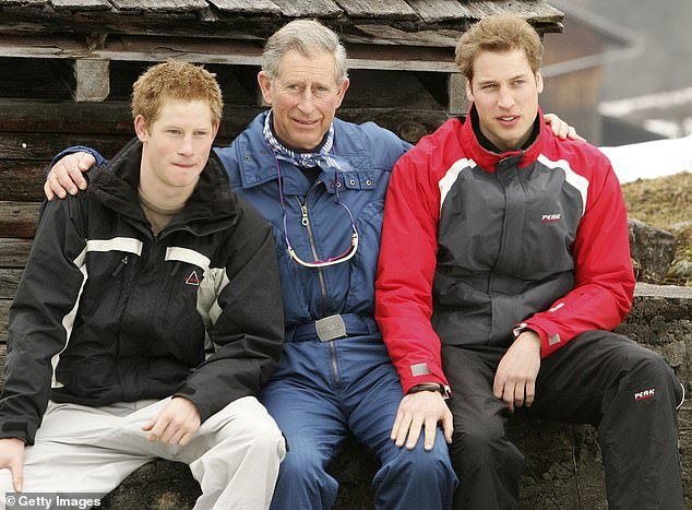 Prince Charles poses with his sons Prince William and Prince Harry during the royal family's skiing holiday in Klosters in 2005