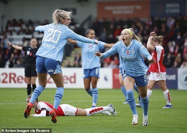 England international Chloe Kelly (right) appeared to have secured a point for Manchester City