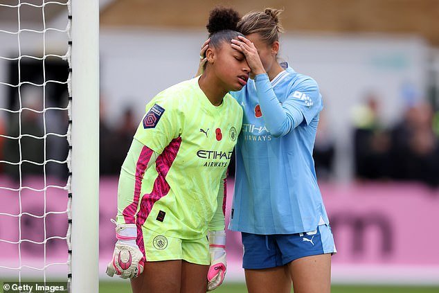 The goalkeeper was comforted by teammates as City's unbeaten WSL start came to an end