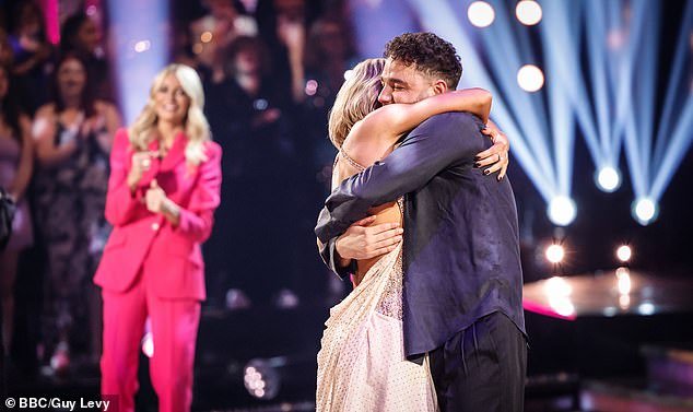 Farewell: Adam and Luba shared a hug after being defeated in a thrilling dance competition