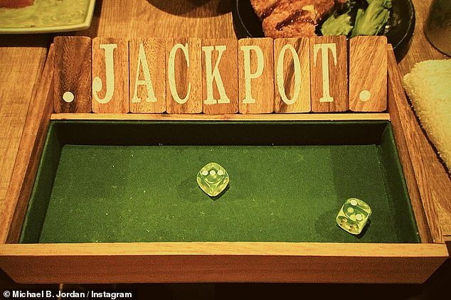 Taking a guess: The Fruitvale Station star snapped a photo of a green felt box with 'JACKPOT' written in large wooden blocks and two translucent yellow dice resting on the felt