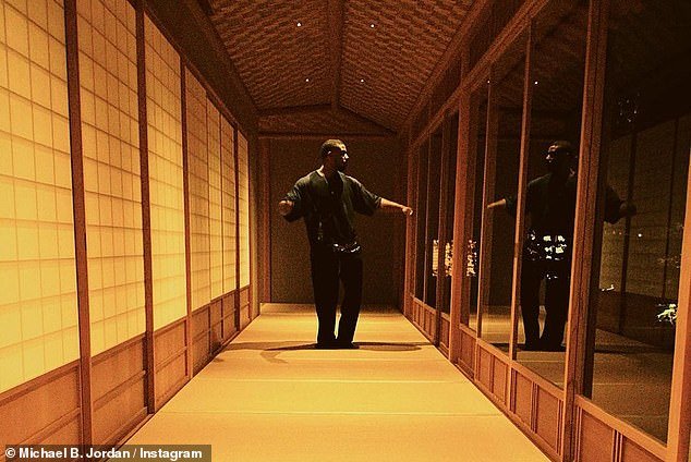 Letting go: He looked like he was dancing and having a great time in a photo of him walking down a hallway with sliding doors covered in shoji paper on one side and windows on the other