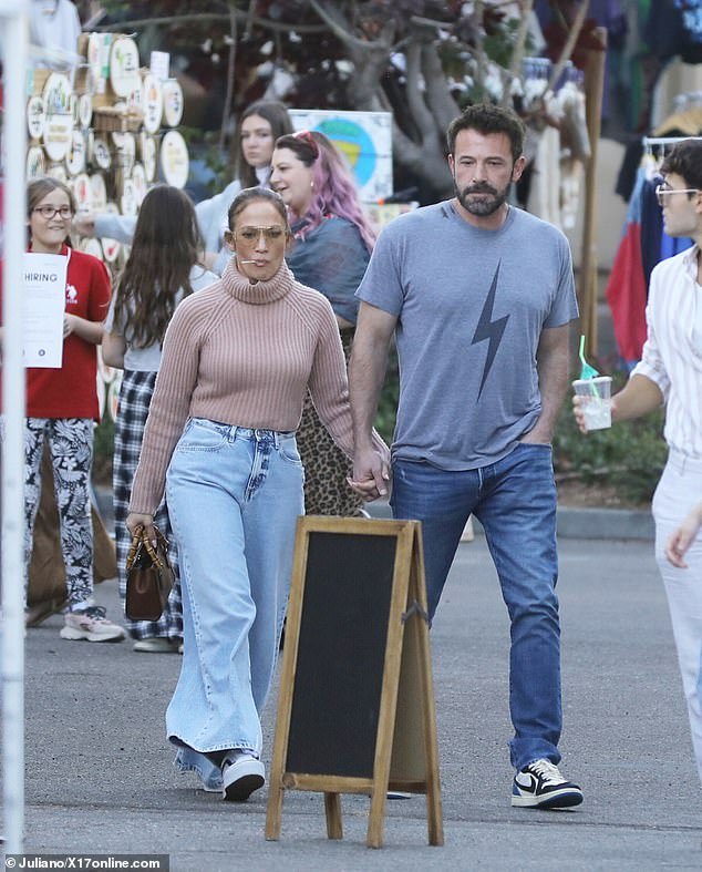Shopping: The Let's Get Loud hitmaker, 54, and the Batman star, 51, enjoyed a shopping spree at the Hollywood flea market