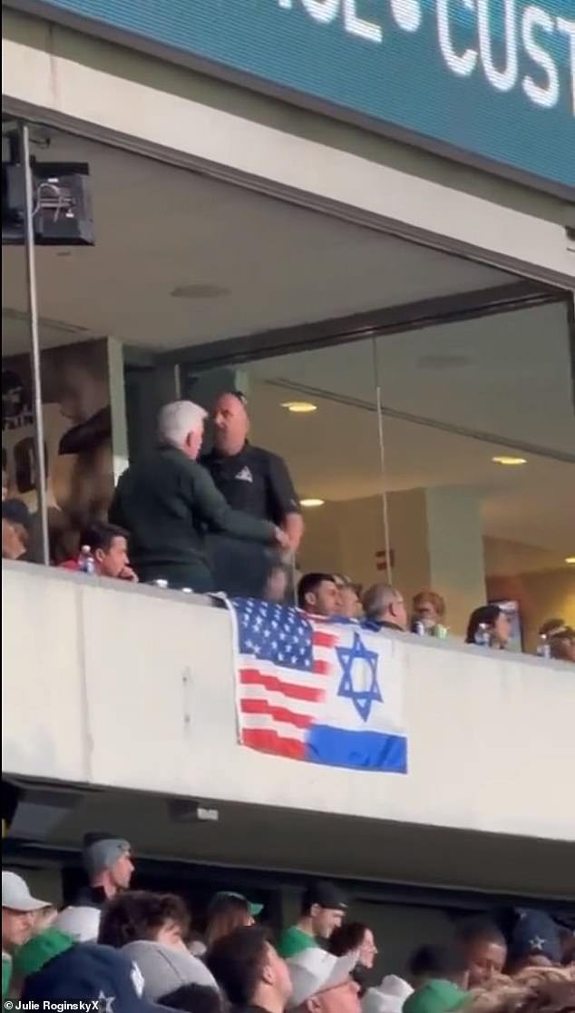 Norcross was seen on video of X being escorted out for flying a half-American/half-Israeli flag outside his suite