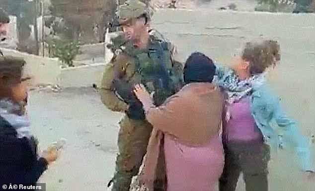 Video showed Tamimi, then 17, hitting an Israeli soldier, for which she was sentenced to eight months in prison