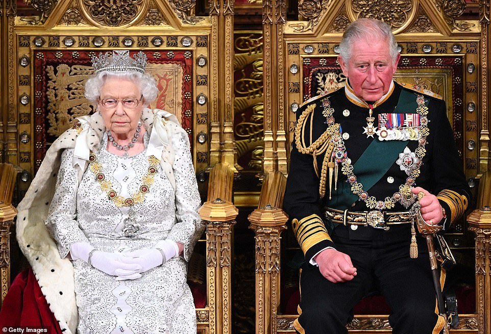 Queen Elizabeth II sits next to her son, King Charles – then the Prince of Wales – at the State Opening of Parliament in 2019