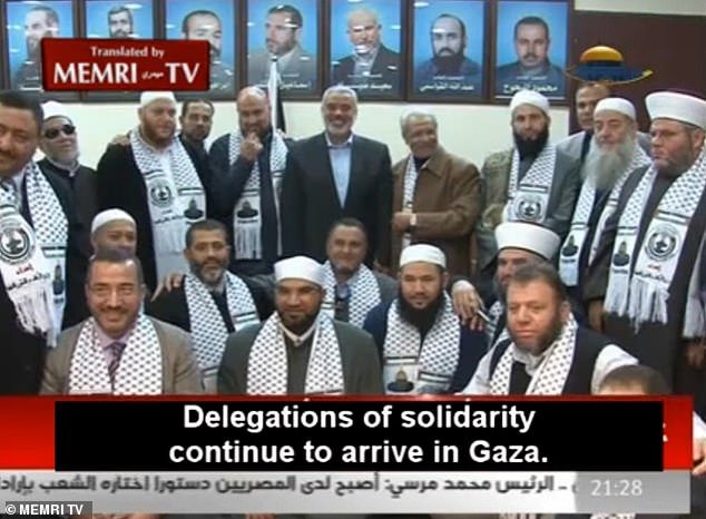 Dr.  Mohammed (pictured center with Hamas leader Ismail Haniyeh) and a delegation of leading Australian Muslim figures traveled to Gaza in 2012