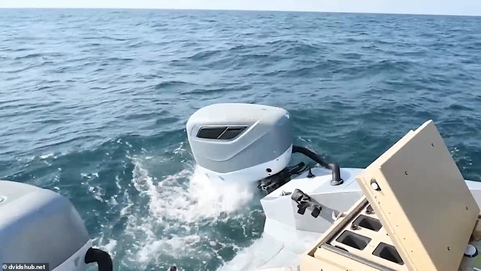 The video shows an unmanned 38-foot double-hulled speedboat, equipped with two outboard motors, plowing through the waves.  Two naval operators monitor the operation from a remote location.  Once the target is found, the 'lethal miniature air-to-air missile system' is activated, firing a projectile.  The video shows him closing in on the target and destroying it.