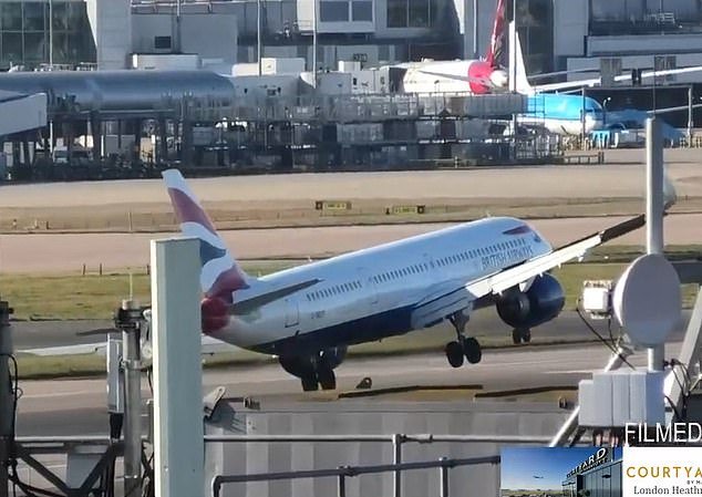 Close shave: This is the shocking moment a pilot struggled to land a British Airways plane at London's Heathrow Airport during a February storm that brought wind gusts of up to 90mph