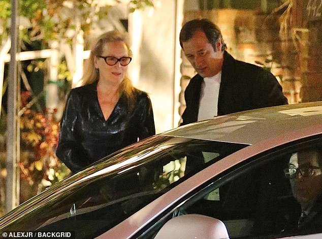 Fun evening: Meryl looked delighted as she stepped out with her son