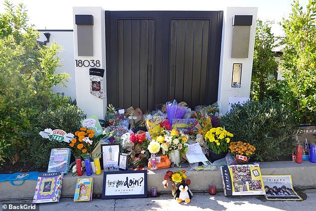 Tributes were left outside Matthew Perry's Los Angeles home, including Friends memorabilia