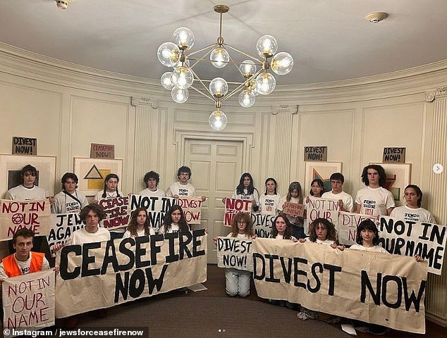 About 20 students entered University Hall around 12:15 p.m. to call on Brown President Christina Paxson to agree to divest companies that profited from the war